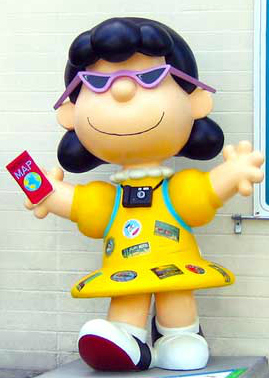 Photo of sculpture of the famous Peanuts™ character Lucy.