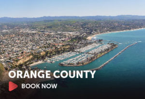 Image of Orange County, California with text that says, "Book Now"